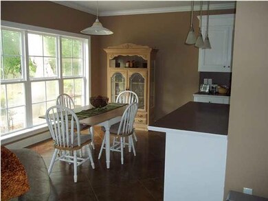 Breakfast Area Overlooks Back Lawn