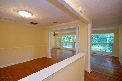 front entrance through dining and living