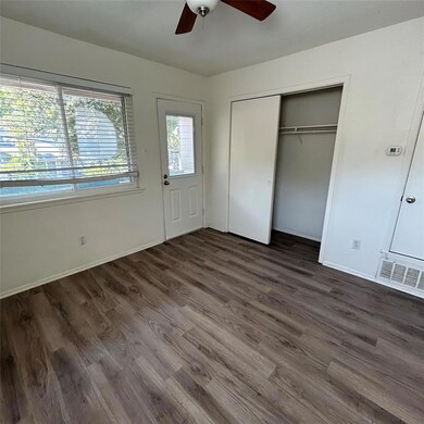Unfurnished bedroom with ceiling fan, visible ven