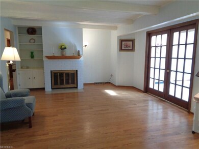 Family room w/wood burning fireplace, closed frenc