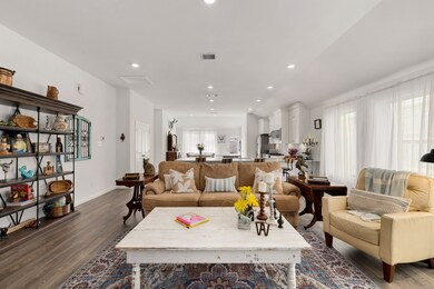 Open-concept floor plan makes this a wonderful space for entertaining all of the way from the kitchen to the family room.
