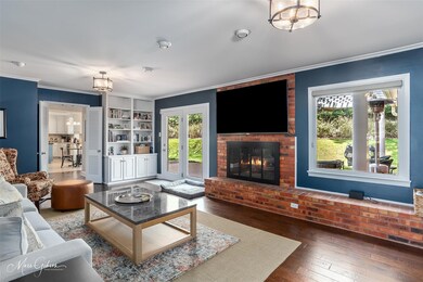 Family den with windows looking to professionally 