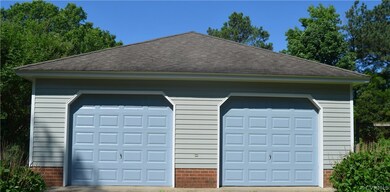 Matching 40 ft. x 28 ft. detached 4-car garage wor