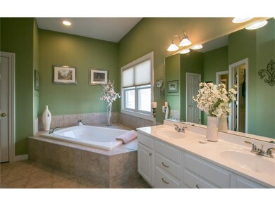 Master Bath with jetted tube, linen closet, dual s