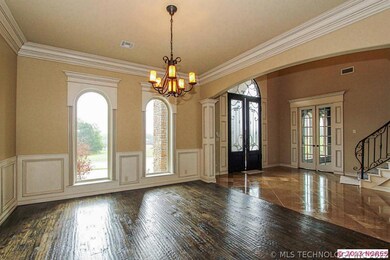 Formal dining room with hand scraped hardwood floo