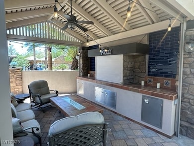 View of patio / terrace with ceiling fan and exter