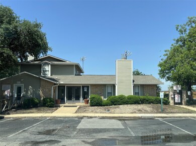 View of front facade with french doors, uncovered