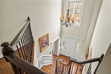 Foyer entrance featuring light hardwood / wood-sty