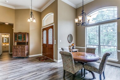 Inside entry with open formal dining area