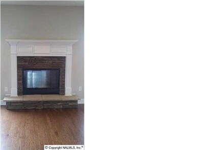 Santa might actually come down this perfectly designed stacked stone wood burning fireplace.