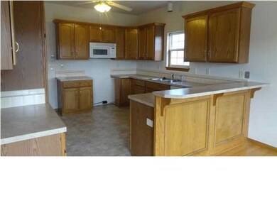 A view of the raised bar eating space in the kitch