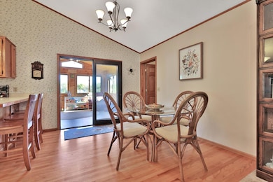 Dining area with patio doors to the 4 season porch.