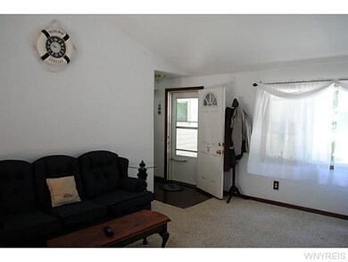 Living Room. Front entrance door opens into living