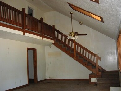 Living Area. Bedroom door visible