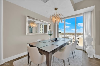 Dining area featuring baseboards, visible vents, w