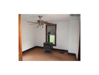Living room with woodburning fireplace