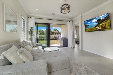 Living room featuring crown molding