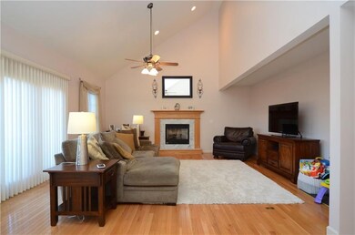 Soaring Ceilings in Family Room and all hardwood f