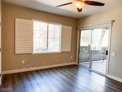 Living with beautiful window and slider access to the​​‌​​​​‌​​‌‌​​​‌​‌​​​‌‌​​​‌‌​​​​​​‌‌​‌‌‌ patio