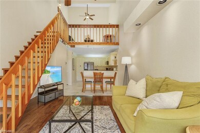 Living room with ceiling fan, hardwood / wood-styl