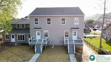 Entrance to townhome apartment from rear parking pad