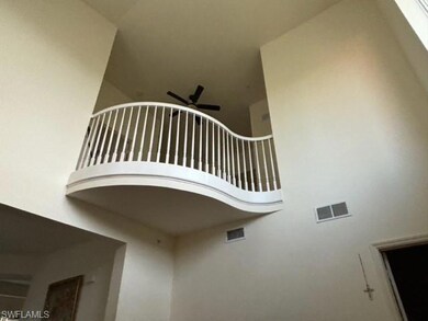 Second floor atrium space overlooks living area