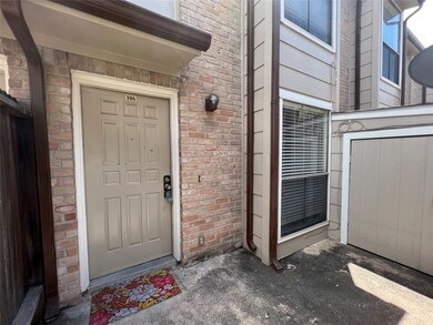 Front door has a private patio
