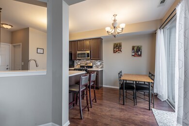Eat-in Kitchen, Sliding Glass Doors to Patio