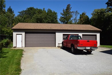 4 Car garage w/storage above