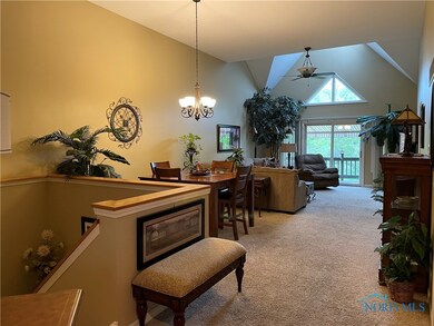 Living room/dining room with 12’ ceilings