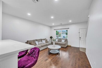 Living room with wood-style floors