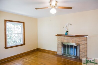 Living Room with Wood Burning Fireplace