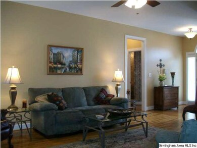 Spacious Family Room with fireplace and hardwood f