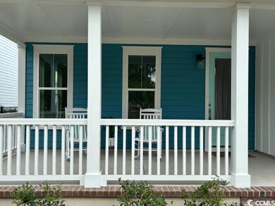 Property entrance featuring covered porch