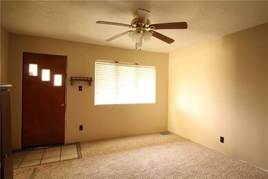 Front Living Room w/ Newer Carpeting, Ceramic Tile