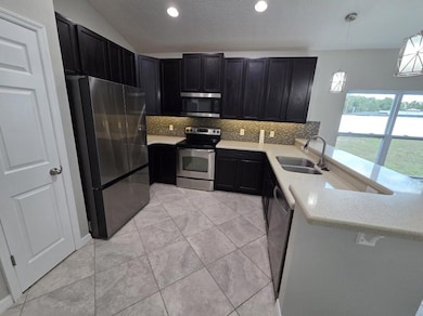 228 Whispering Pines Way, Davenport, FL 33837 - photo 5