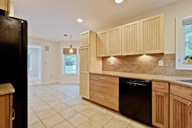 Kitchen looking into breakfast nook
