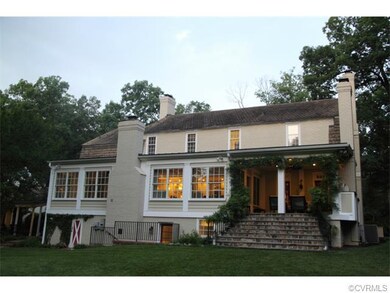 Rear elevation of lanai, walkout basement, and bri