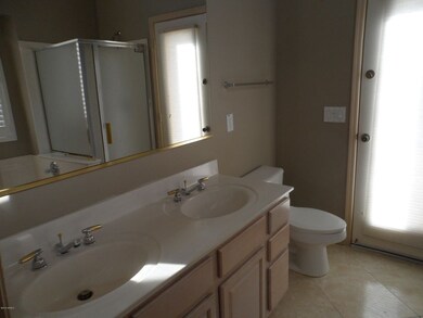 MASTER W/ 2 SINKS, TILE, EXIT TO PATIO