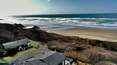 House to sandy beach