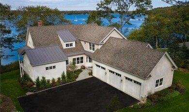 This stunning 4BR, 4.5BA Waterfront...