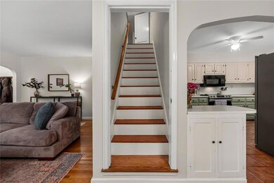 Staircase Features Hardwood Treads.