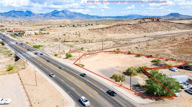 Aerial view of property and surrounding area with