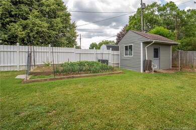 Raised bed garden area and 13.5 x 11.2 floored she