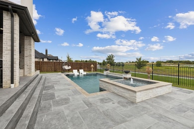 View of pool featuring a fenced backyard, a fenced