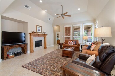 Spacious family room with 15 ft ceilings - firepla