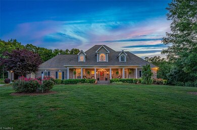 Stunning Home with loads of Main Level Living! Nestled in a cul de sac on over 3 acres!