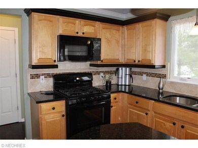 Beautifully appointed kitchen with newer gas stove