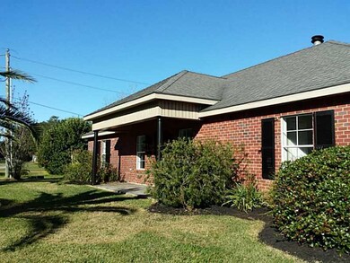 Exterior Front. NICE LANDSCAPING AND SLATE PORCH