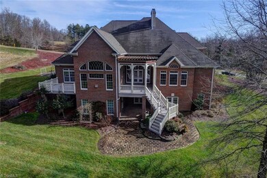 Decks off Sunroom, breakfast room, lower level patio